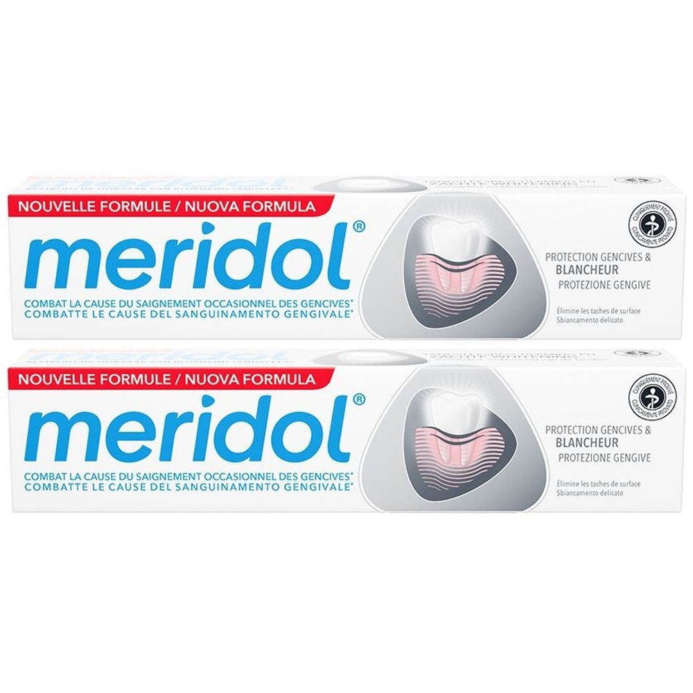 Deux tubes de dentifrice. Inscription: meridol, Protection Gencives & Blancheur. Nouvelle formule. Protège les gencives et blanchit les dents.