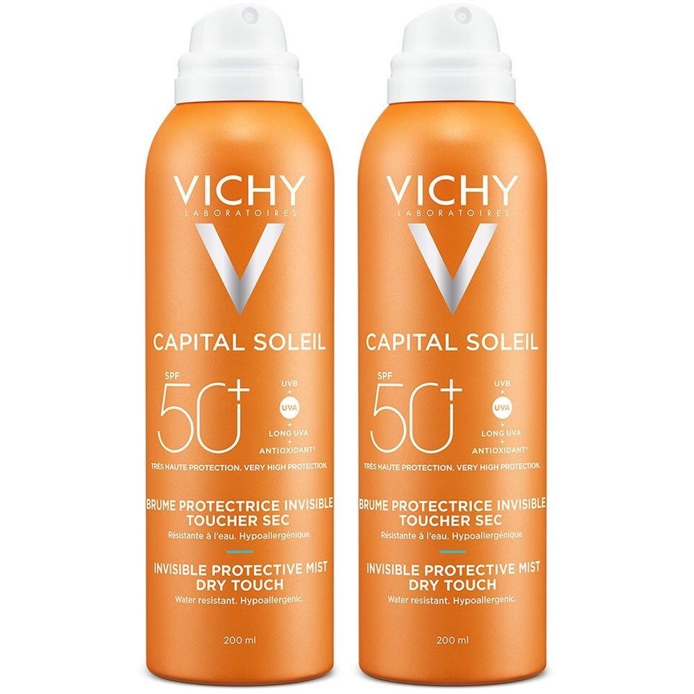 Deux sprays orange avec bouchons blancs. Inscription: VICHY, CAPITAL SOLEIL, SPF 50+. Brume protectrice invisible, toucher sec.