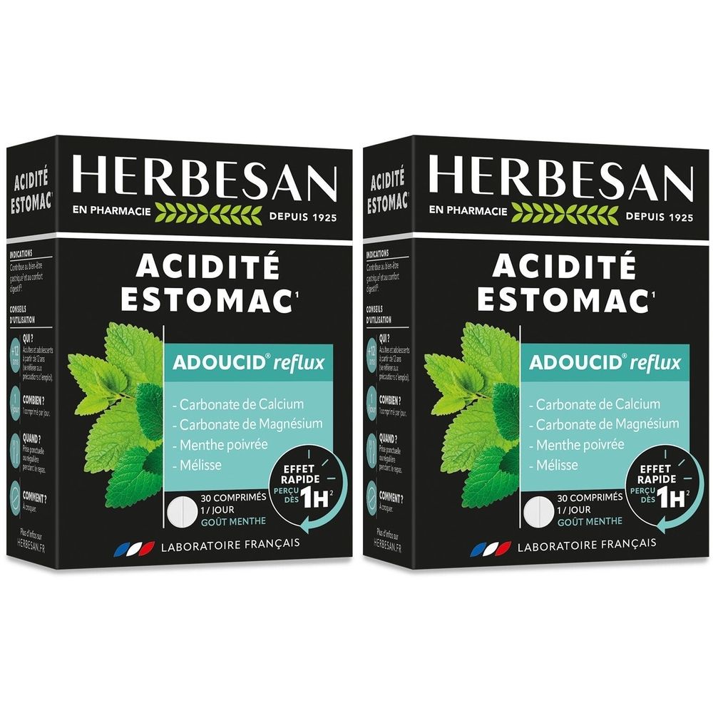 Deux boîtes Herbesan® Adoucid® Estomac. Emballage noir avec texte blanc. Contient 30 comprimés. Goût menthe.