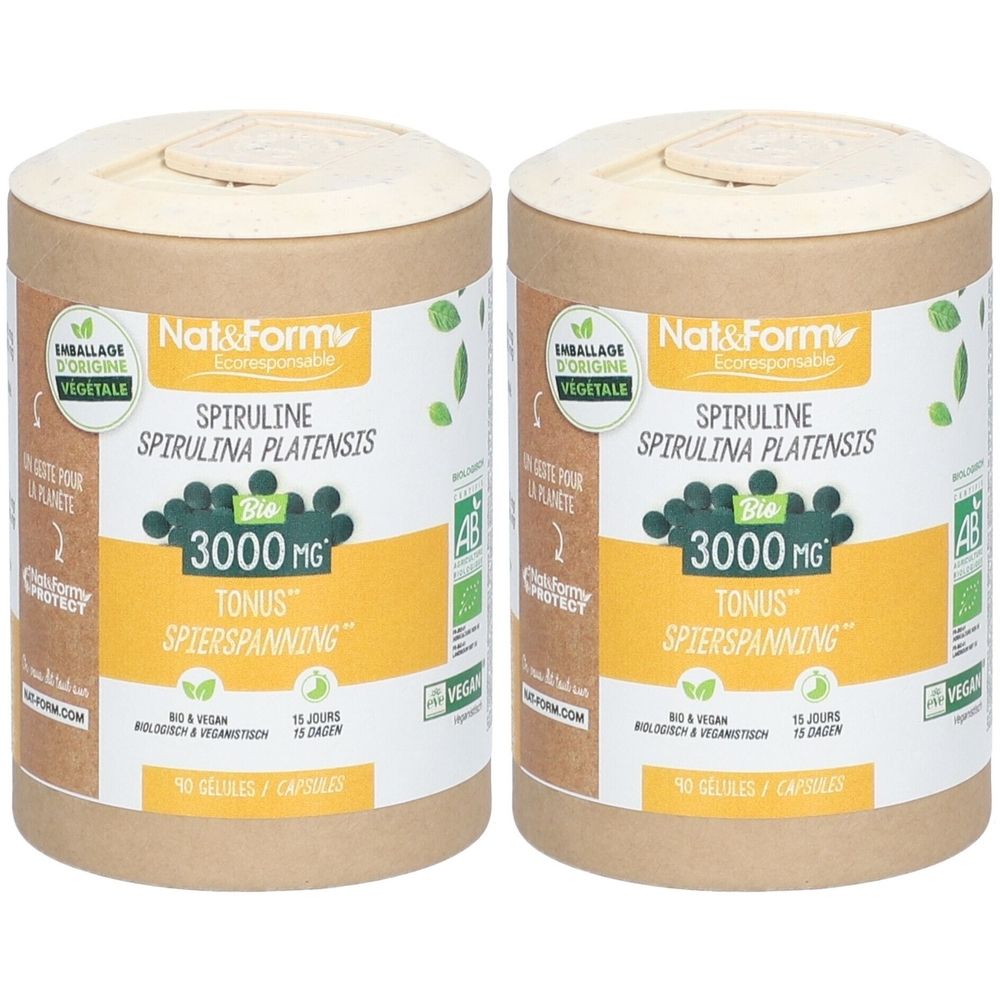 Deux boîtes cylindriques avec couvercles. Inscription : Nat&Form, Spiruline, 3000 MG, Tonus, SpierSpanning. Certification Bio et label Vegan.