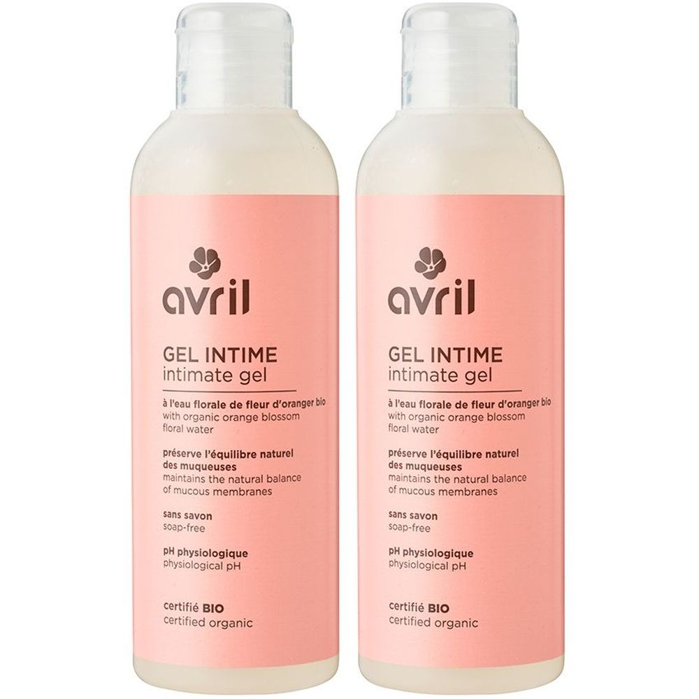 Deux flacons de gel intime Avril. Étiquette rose avec texte. Certifié bio. Bouchon blanc.