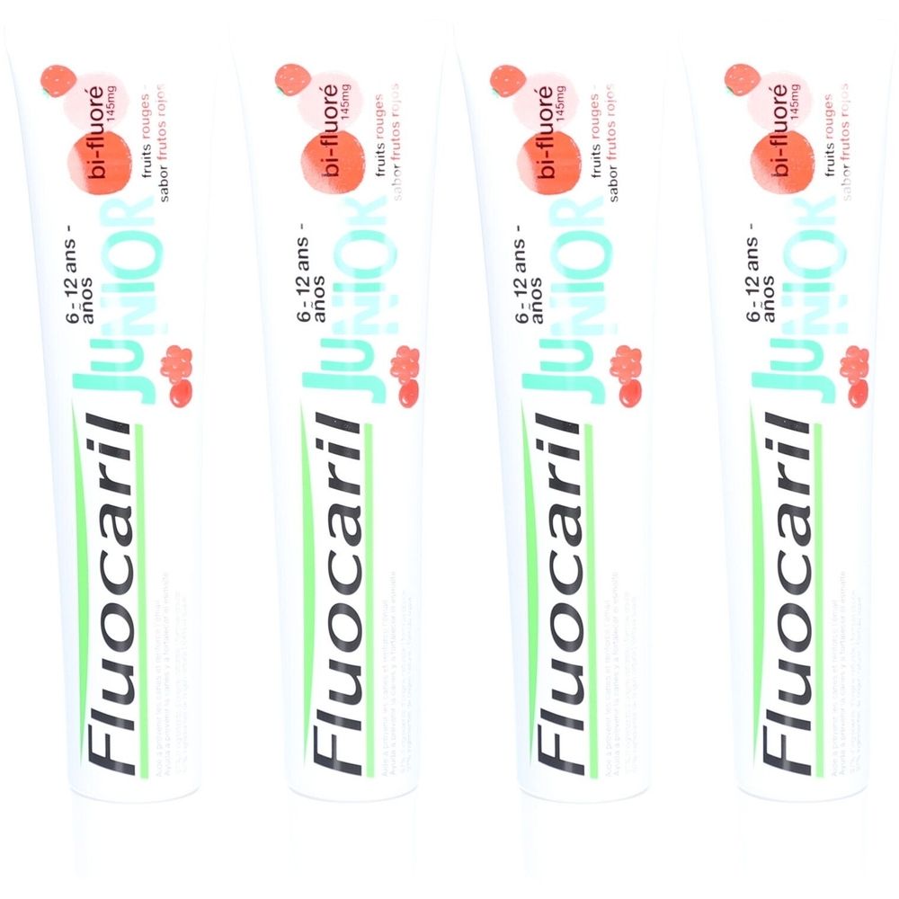 Quatre tubes de dentifrice. On lit "Fluocaril Junior", "bi-fluoré" et "6-12 ans" sur chaque tube.