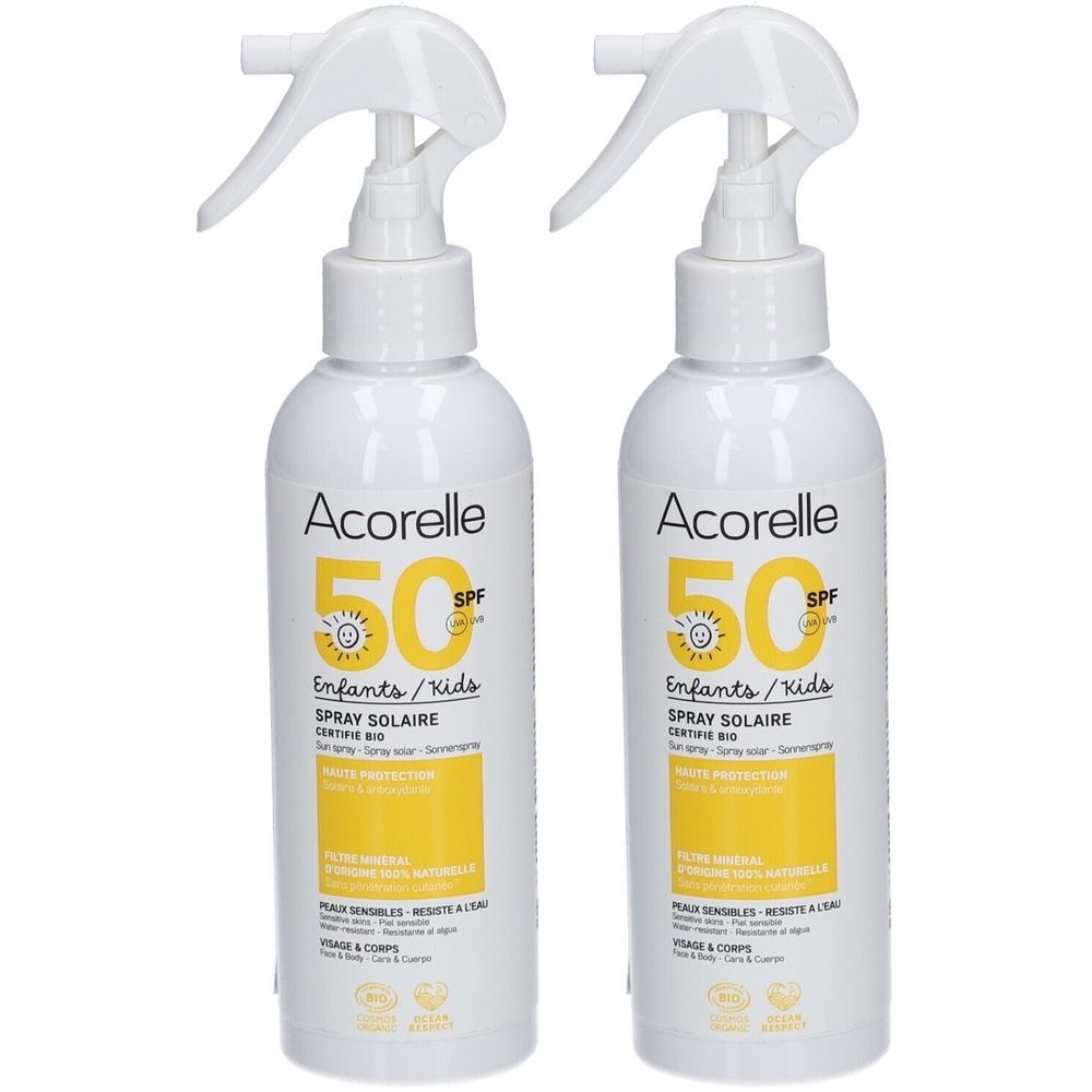 Deux flacons spray blancs avec détails jaunes. Inscription: Acorelle 50 SPF, Spray Solaire, Enfants/Kids. Certification Bio.