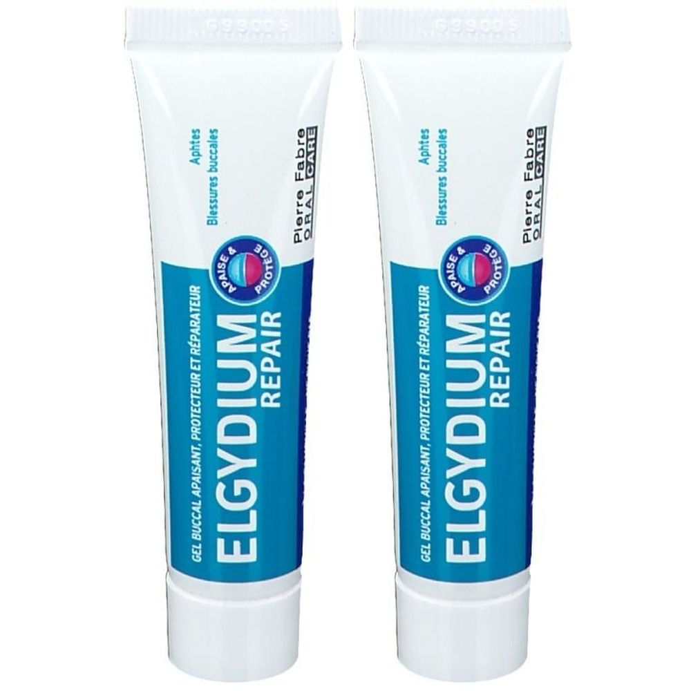 Deux tubes de gel ELGYDIUM Repair. Emballage blanc et bleu. Inscription : Repair, Aphtes, Blessures buccales.