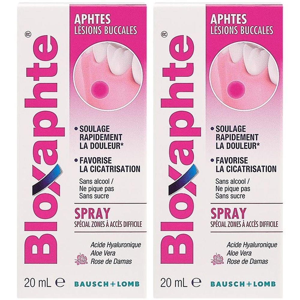 Deux boîtes identiques de Bloxaphte Spray, 20 ml. Emballage rose et blanc avec informations produit et logo Bausch + Lomb.