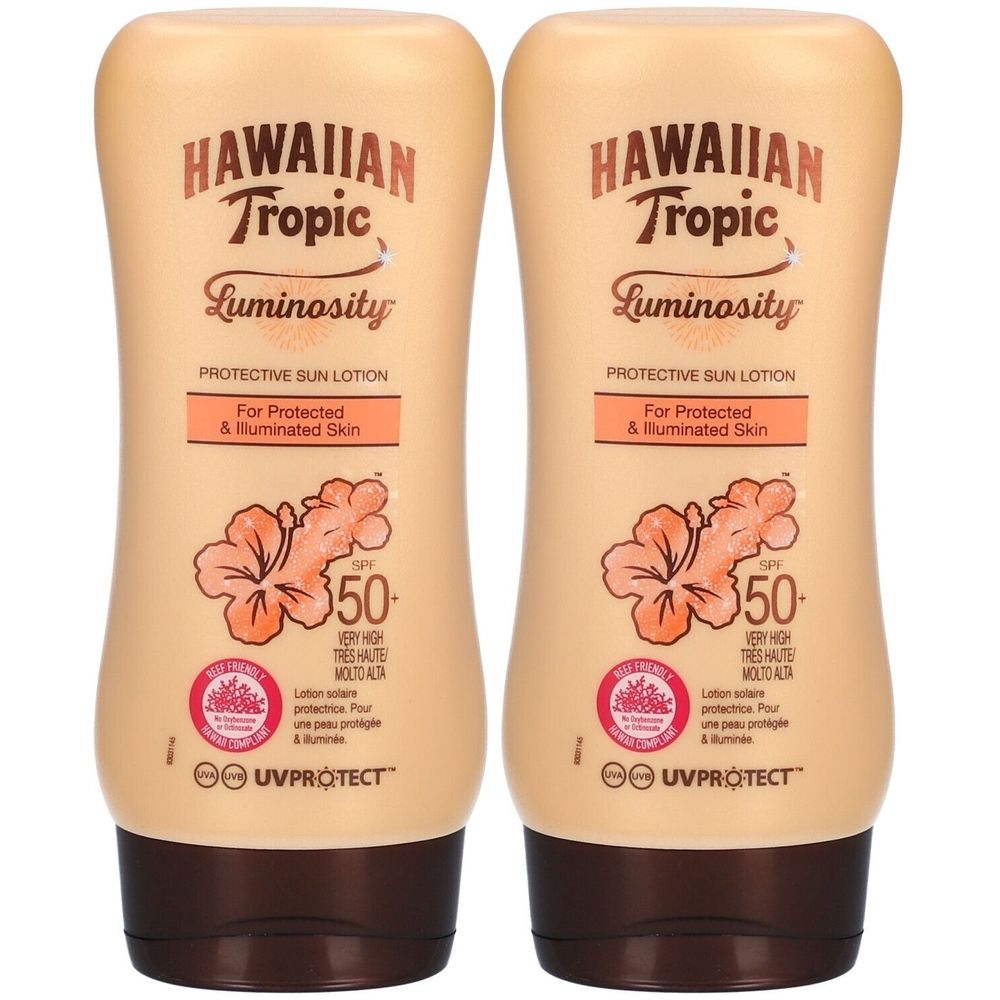 Deux flacons de lotion solaire. Inscription: HAWAIIAN Tropic Luminosity, SPF 50. Pour une peau protégée et illuminée.