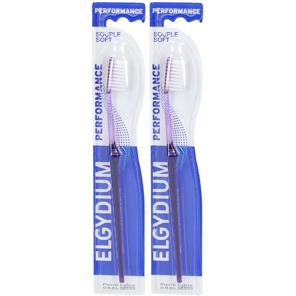 Deux brosses à dents emballées. Soie violette, manche bleu. Marque: Elgydium Performance.