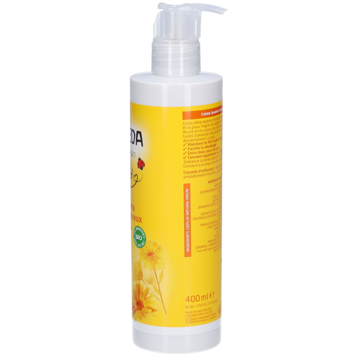 Flacon blanc avec étiquette jaune. Inscription: WELEDA baby Crème lavante Corps et Cheveux Calendula. Avec distributeur. Volume: 400ml.