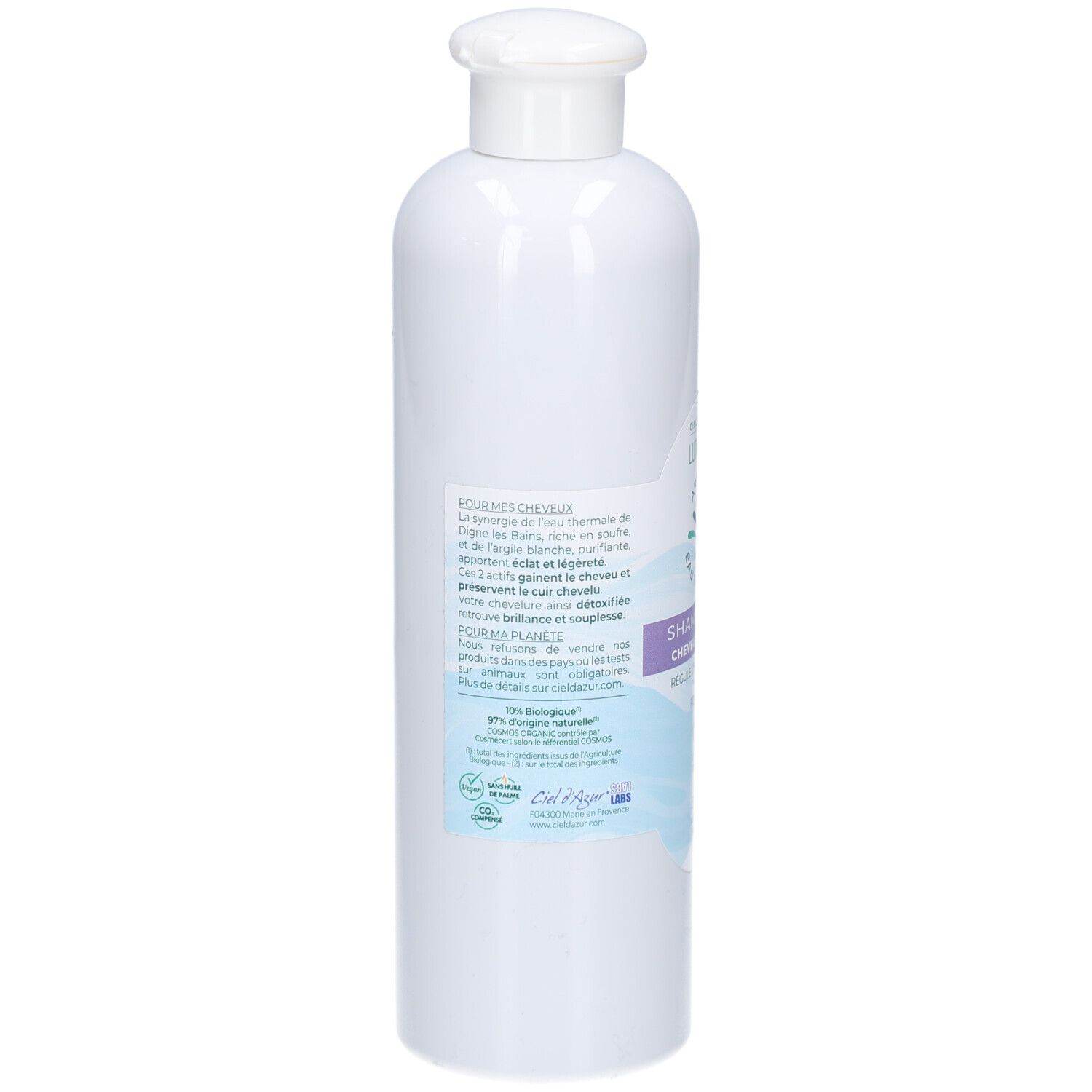 Dos du flacon de shampooing blanc. Textes descriptifs. Logo de certification bio. Informations sur les ingrédients et le fabricant.