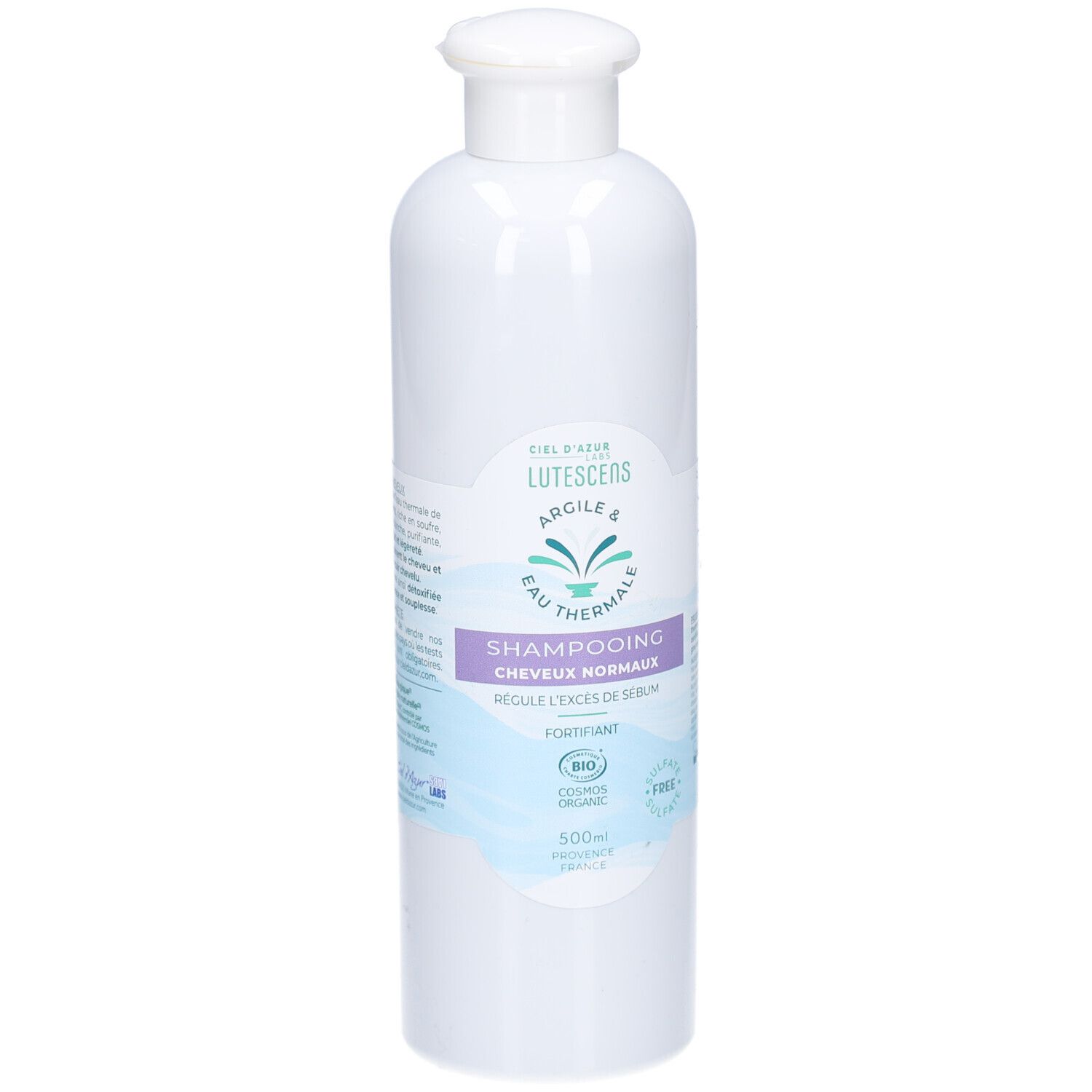 Flacon de shampooing blanc Lutescens. Inscription: Shampooing Cheveux Normaux. Certifié bio. Contient de l'argile et de l'eau thermale.