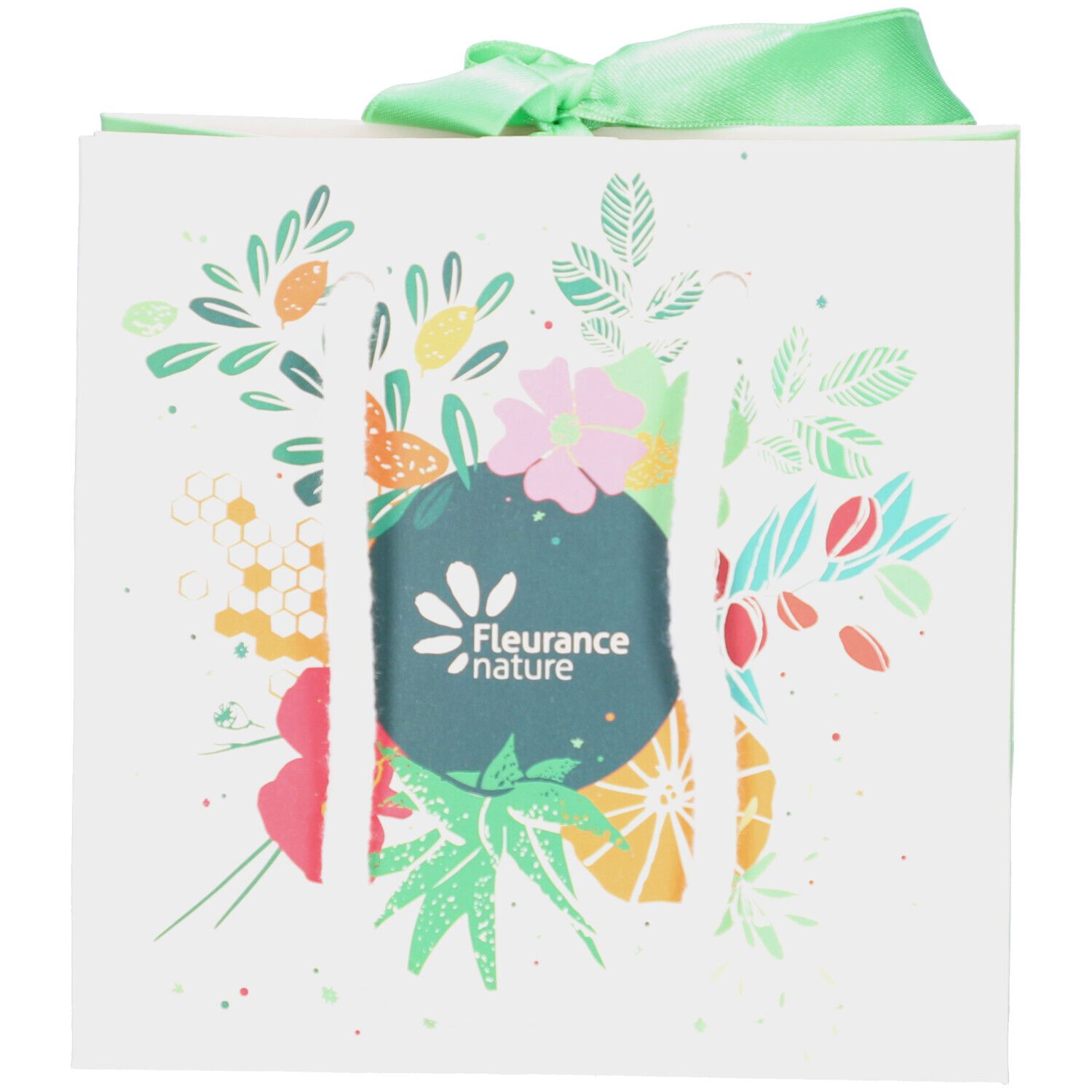 Sac en papier blanc avec motif floral et ruban vert. Logo: Fleurance nature. Découpes pour anses.