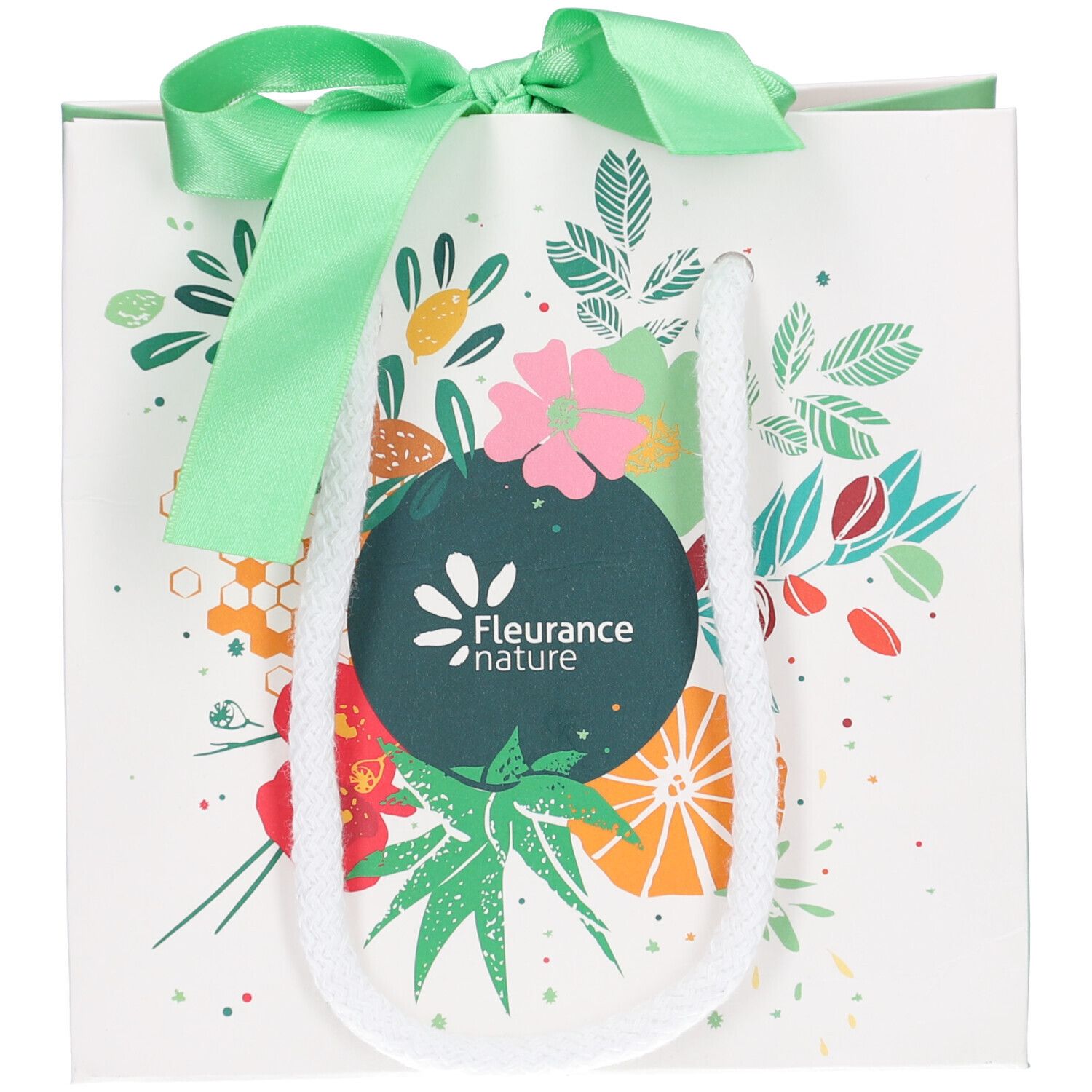 Sac en papier blanc avec ruban vert et anse. Motif floral coloré et logo. Marque : Fleurance Nature.