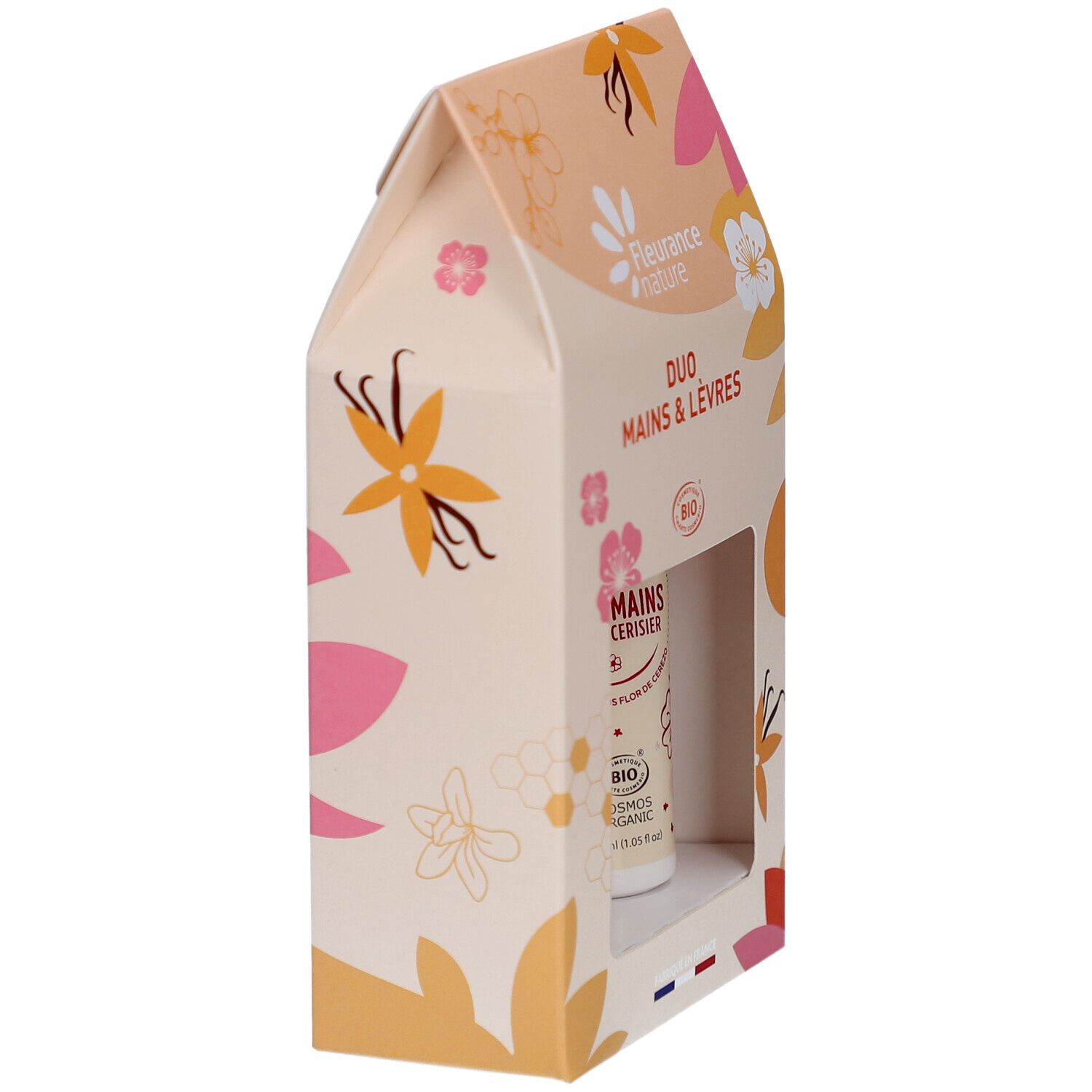 Vue latérale du coffret Duo Mains & Lèvres. Crème mains visible. Imprimé floral, label Bio.