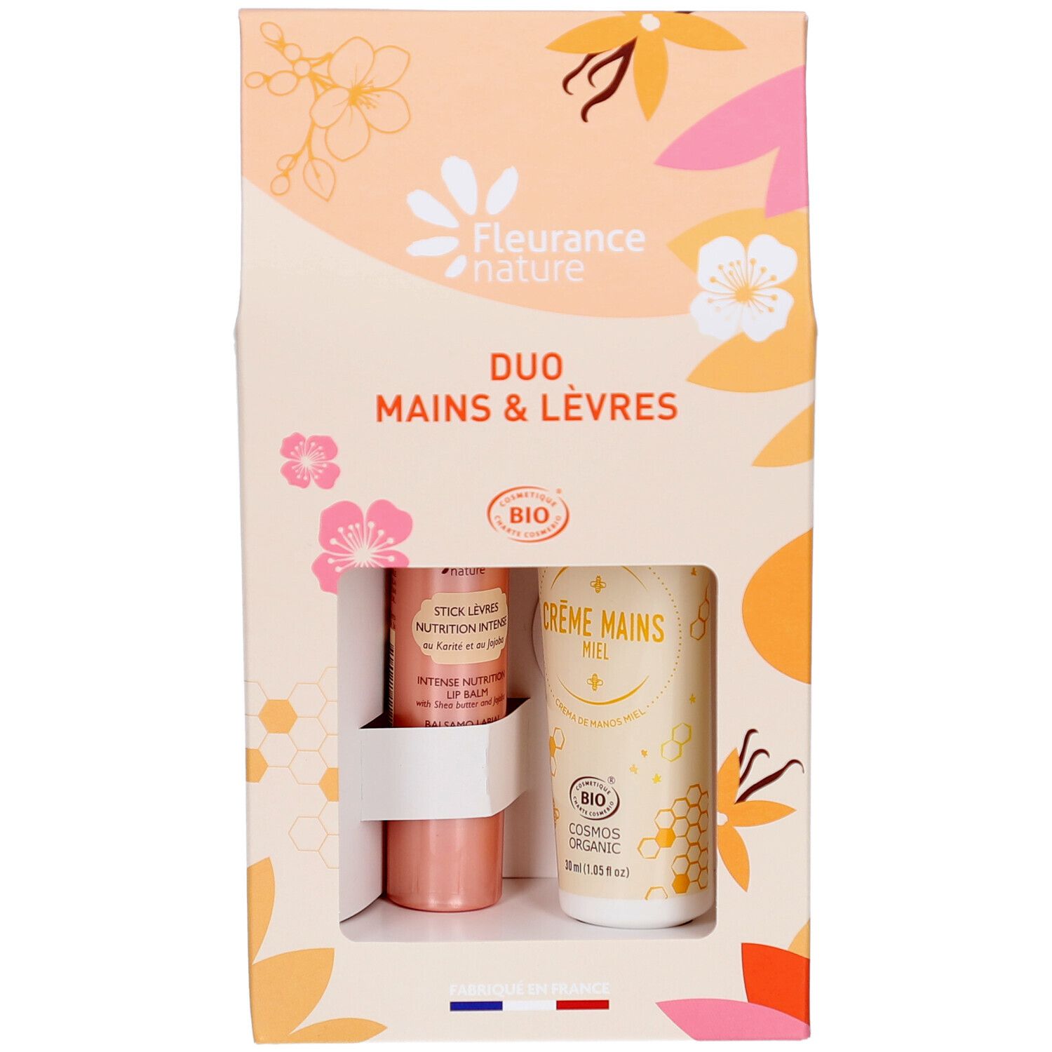 Coffret Duo Mains & Lèvres. Contient stick lèvres et crème mains. Certification bio. Motifs floraux.