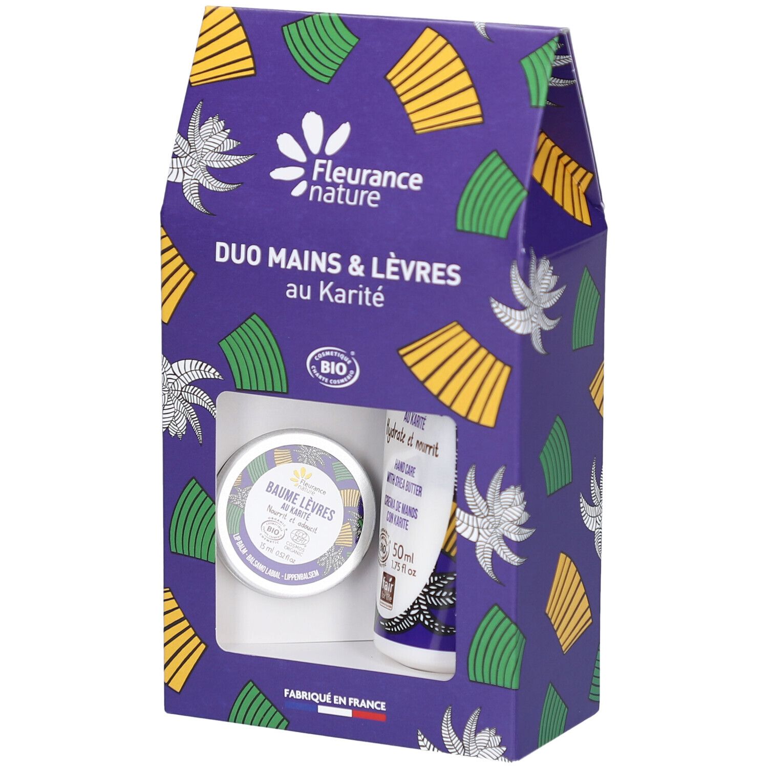 Coffret Duo Mains & Lèvres au Karité. Emballage violet avec motifs floraux. Contient un baume à lèvres et une crème pour les mains.