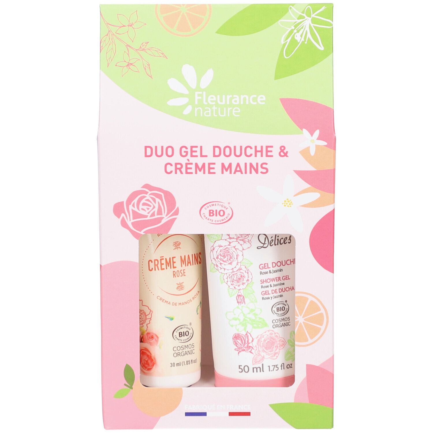 Coffret duo gel douche et crème mains. Tubes roses avec motifs floraux. Label bio. Texte: Duo Gel Douche & Crème Mains.