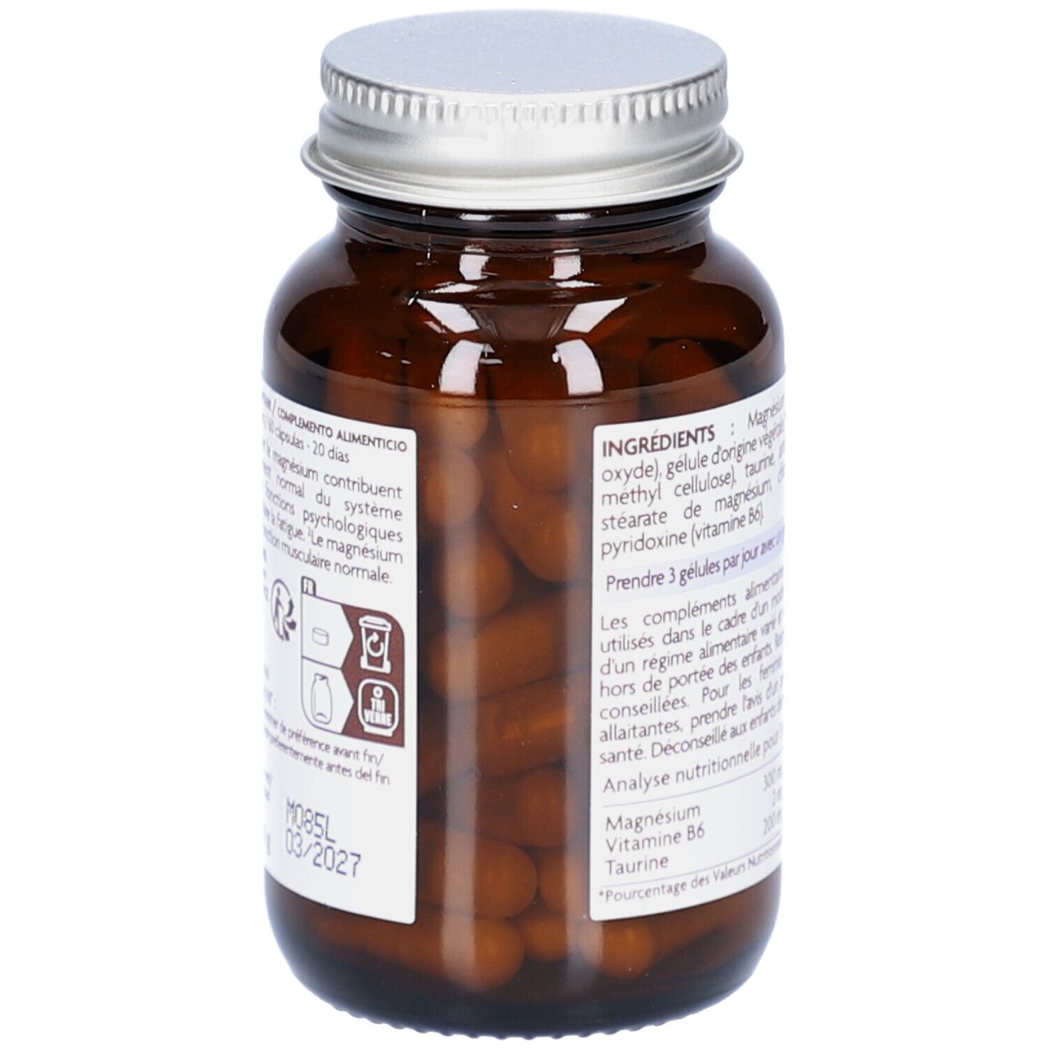 Flacon en verre brun avec capsules. Étiquette avec ingrédients et date de péremption. Texte: Magnésium, vitamine B6, taurine.