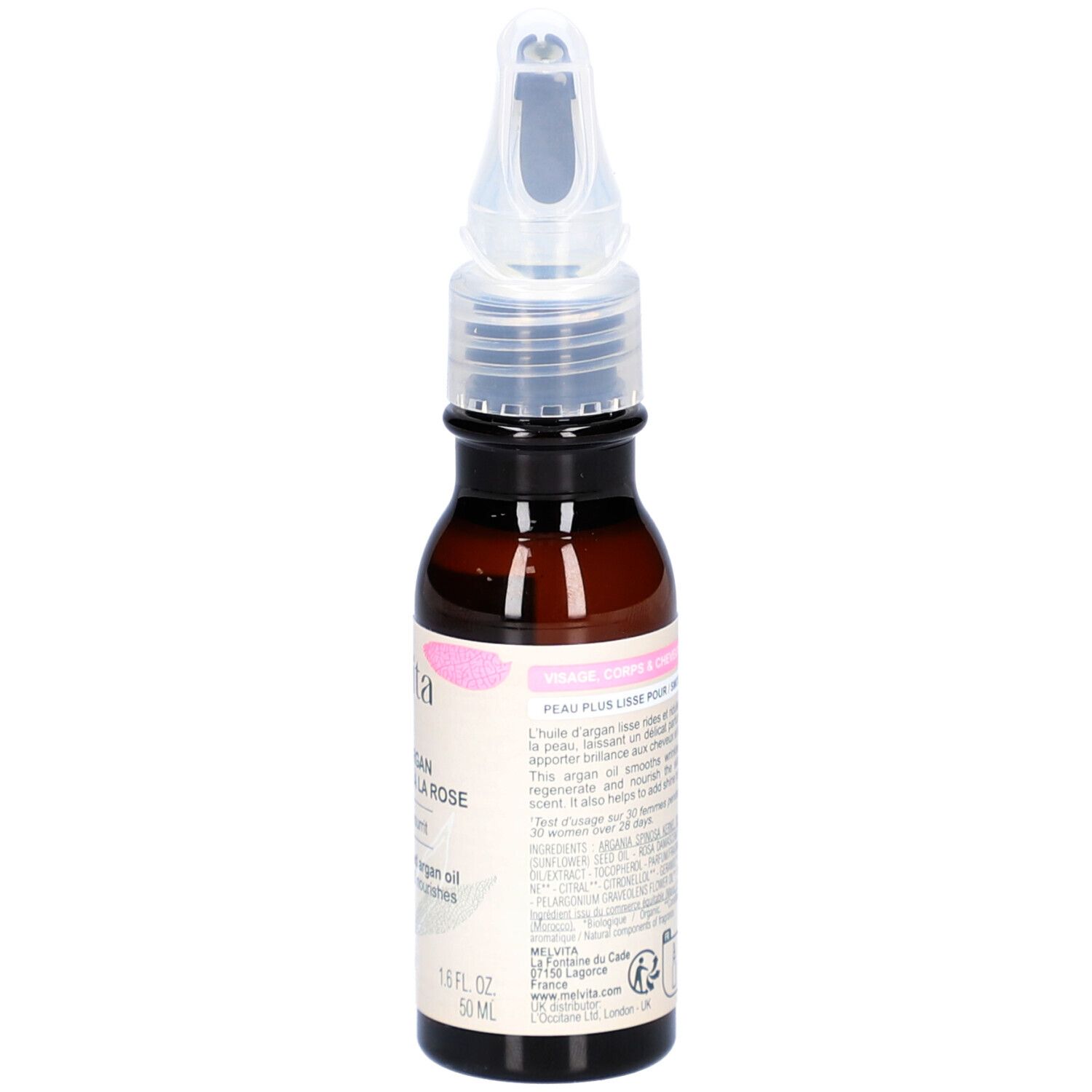 Flacon en verre brun avec étiquette. Texte: Huile d'Argan Parfumée à la Rose. Instructions d'utilisation. 50 ml.