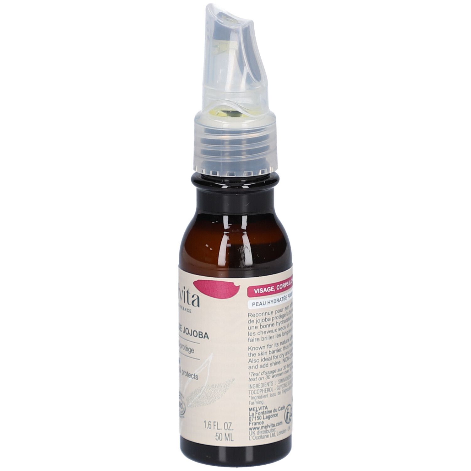 Flacon en verre brun avec vaporisateur. Étiquette avec texte. Contient des informations pour le visage, le corps et les cheveux. 50 ml.