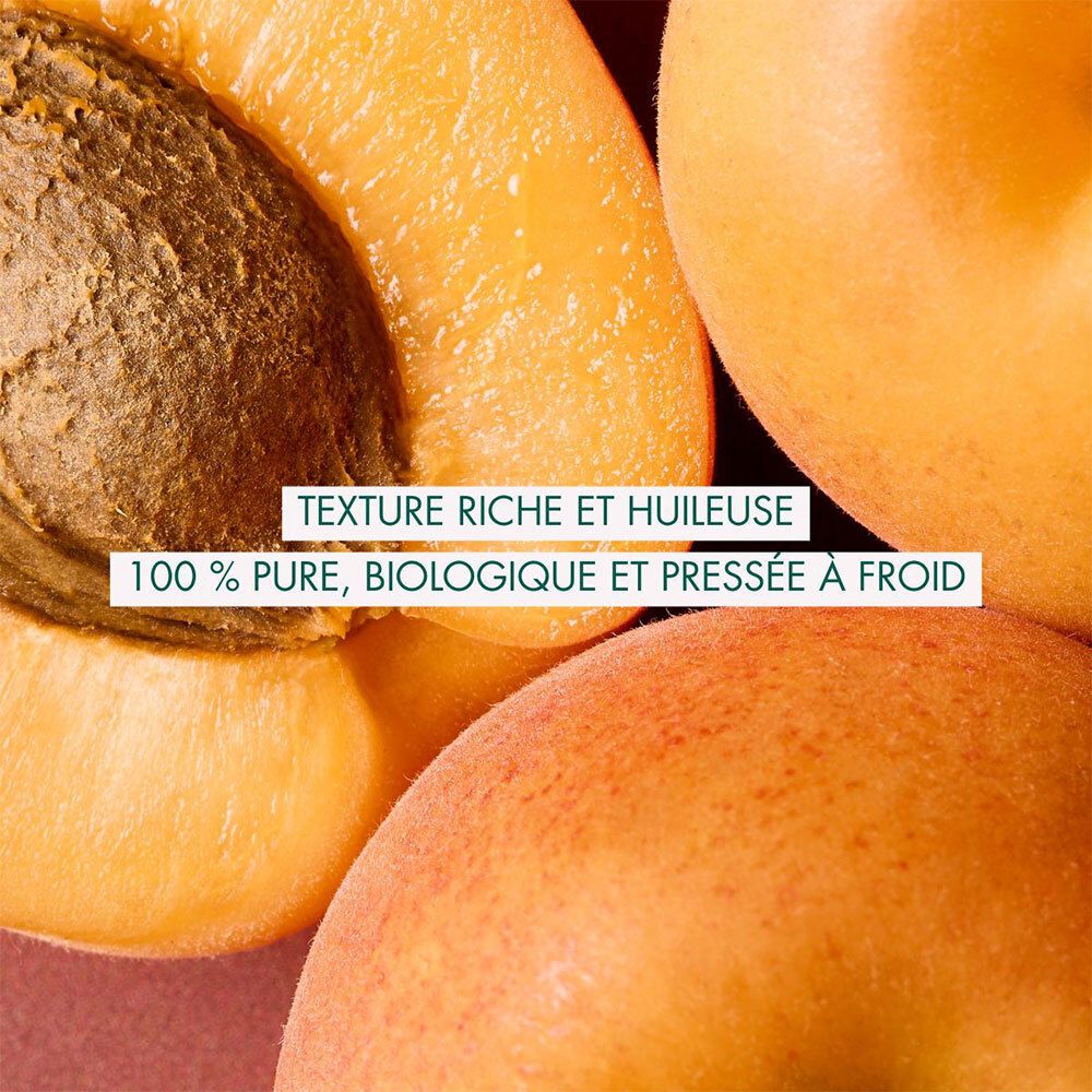 Moitiés d'abricots. Texte : Texture riche et huileuse. 100% pure, biologique et pressée à froid.