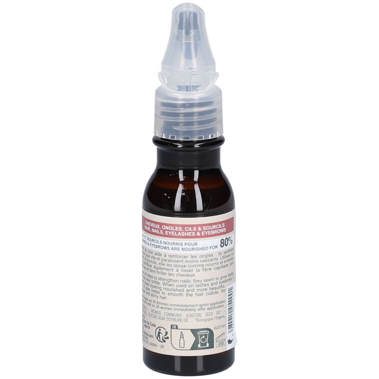 Flacon en verre brun avec applicateur. Étiquette avec texte. Dos avec texte.