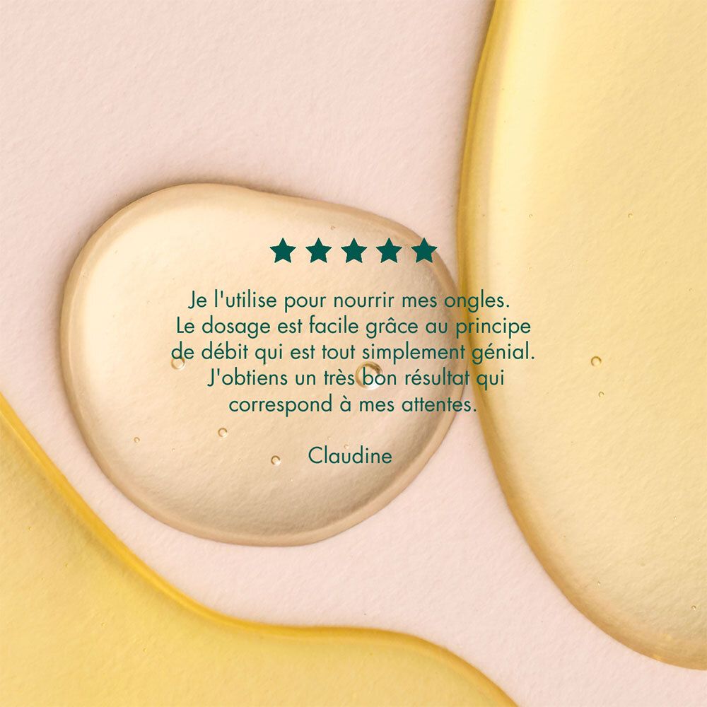 Gros plan sur des gouttes d'huile. Texte: Je l'utilise pour nourrir mes ongles. Dosage facile.