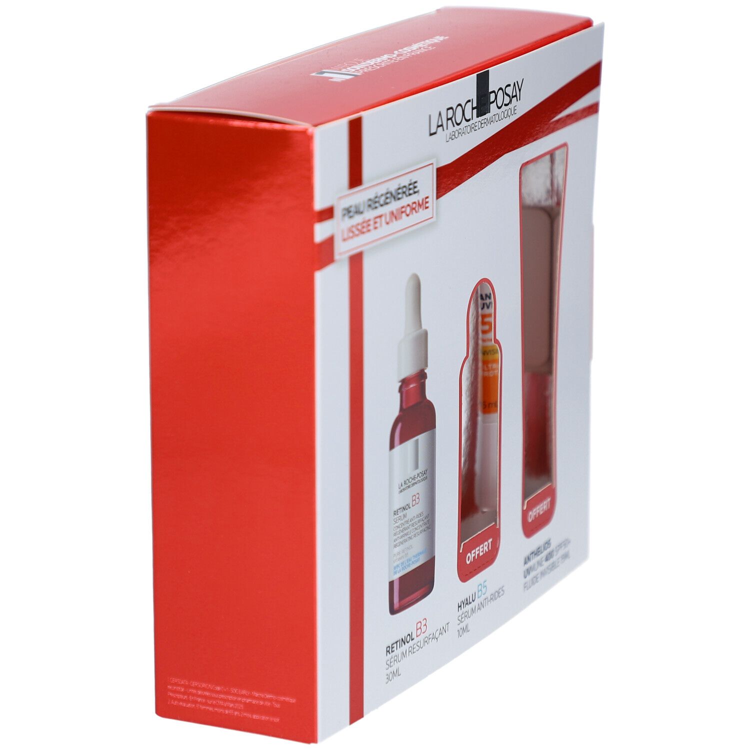 Coffret cadeau rouge et blanc. Contient trois produits. Fenêtres montrent Sérum Retinol B3, Sérum Hyalu B5 et Anthelios UVmune 400.