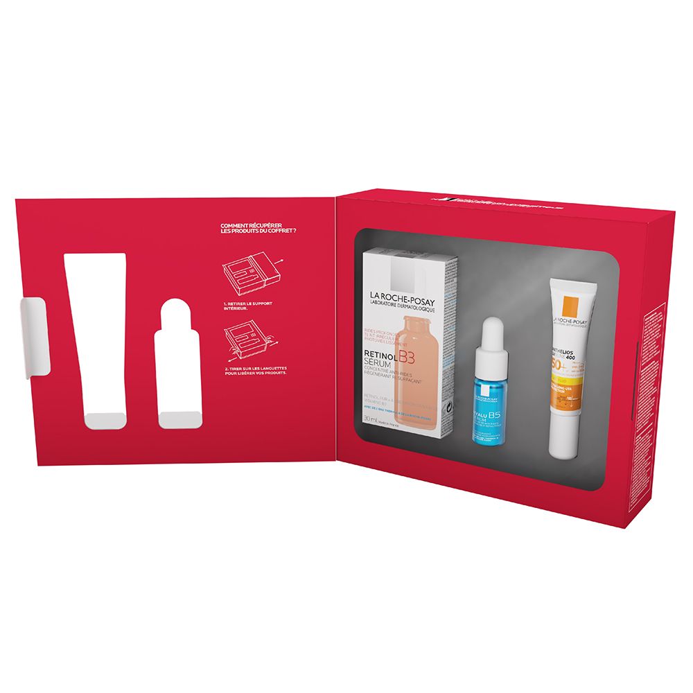Coffret ouvert avec 3 produits: Retinol B3, Hyalu B5 et Anthelios. Intérieur rouge. Instructions.
