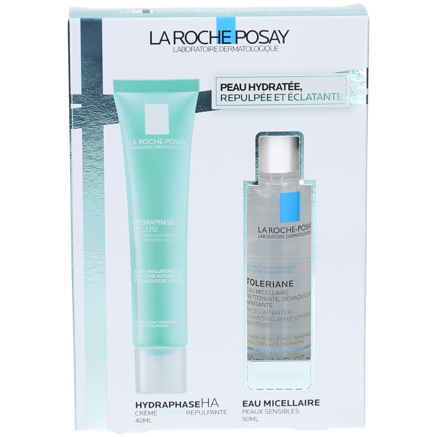 Coffret cadeau avec tube de crème et flacon. Les deux produits sont dans une boîte avec le nom de la marque et le nom du produit.