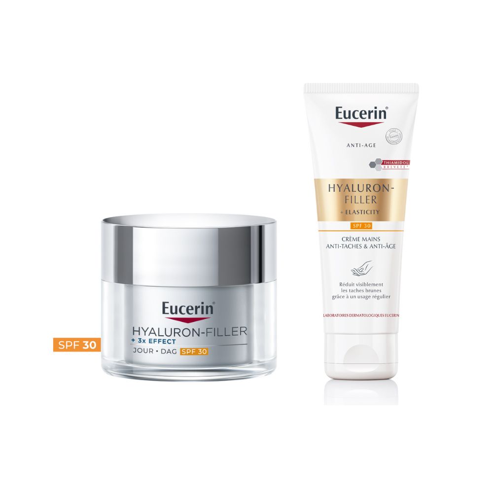 Deux produits Eucerin : crème de jour et crème pour les mains. Les deux avec SPF 30. Sur fond blanc.
