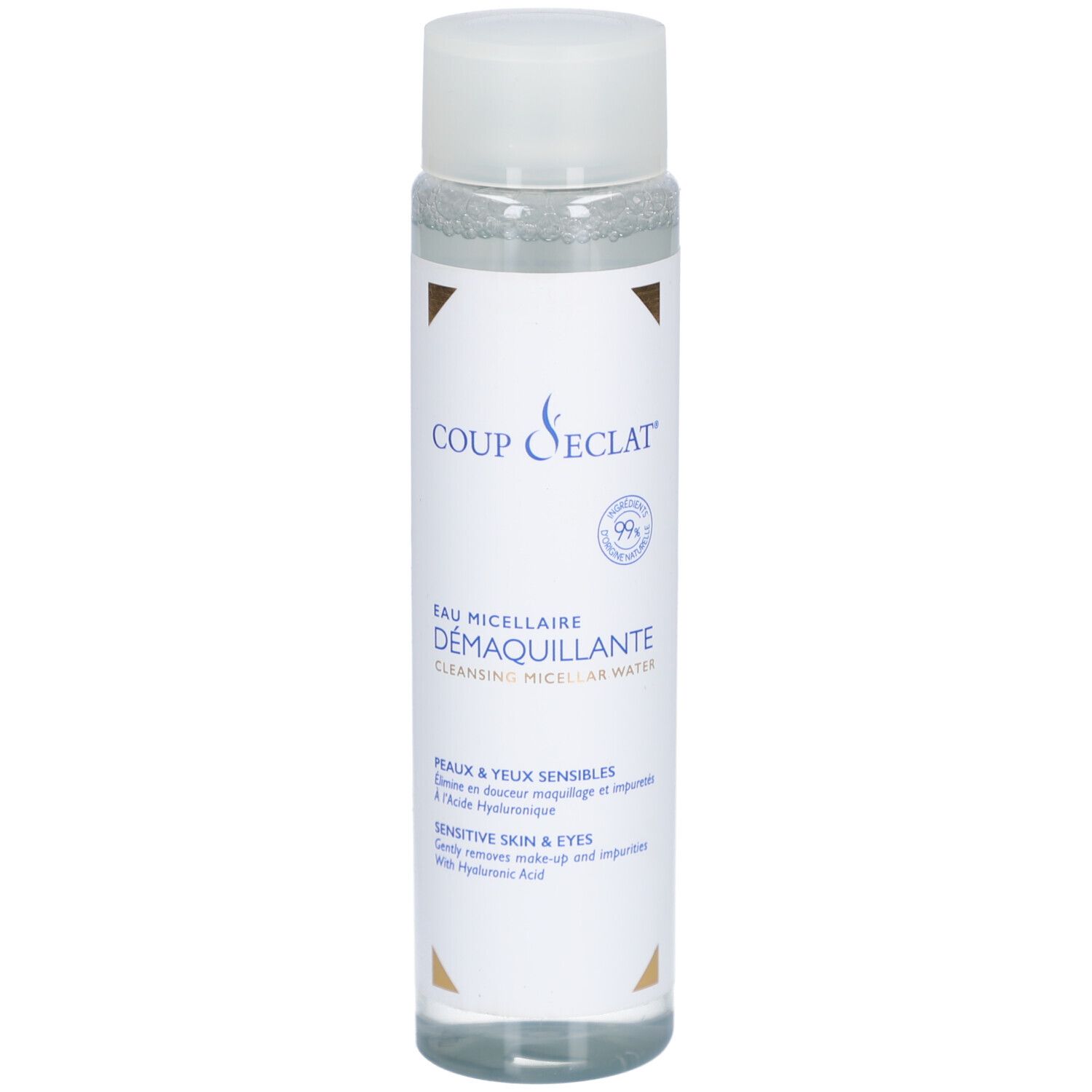 Flacon transparent avec bouchon blanc. Inscription: COUP D'ECLAT, EAU MICEL DEMAQ, Peaux & yeux sensibles. Avec acide hyaluronique.