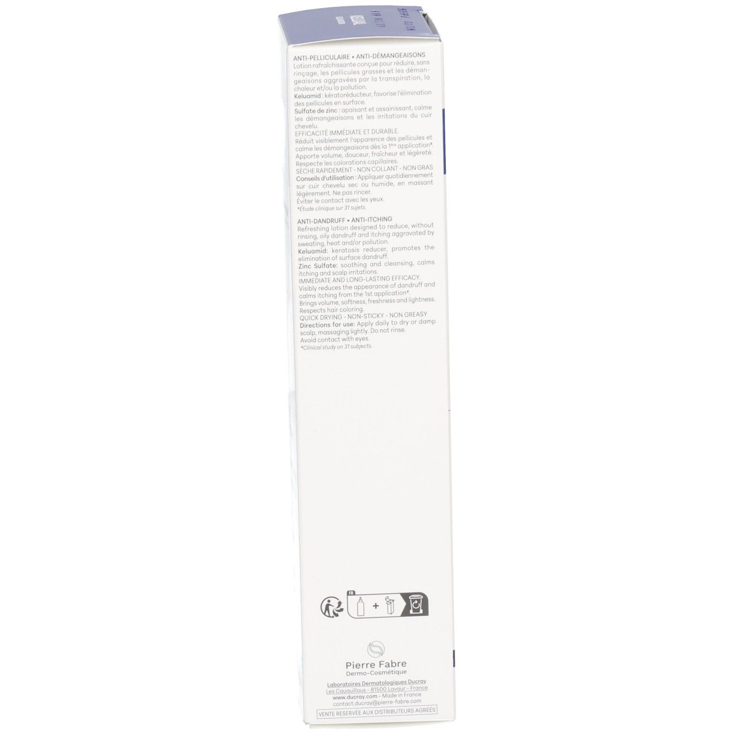 Emballage en carton. Dos. Texte multilingue. Informations du fabricant.