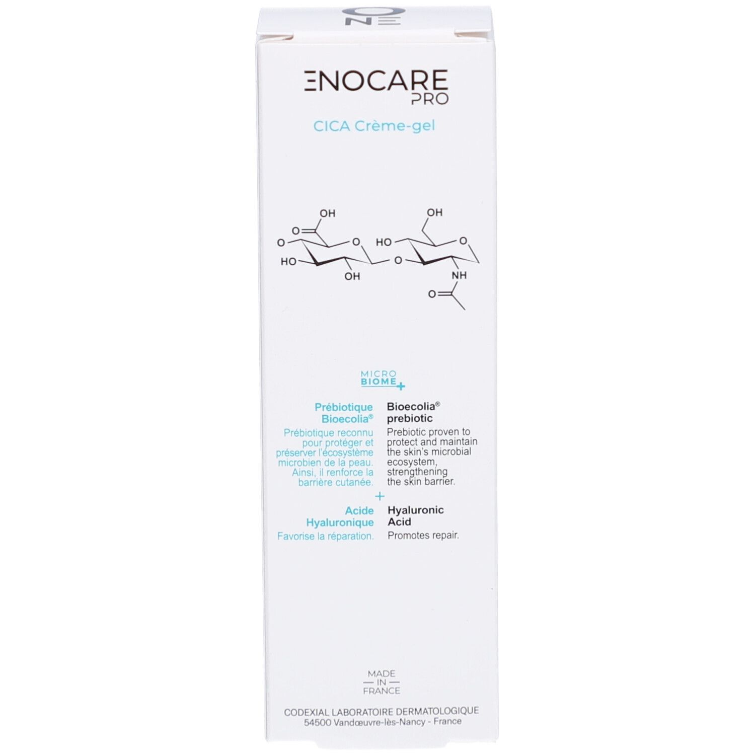 Boîte blanche, vue latérale. Diagramme avec structures chimiques. Contient des informations sur le produit.