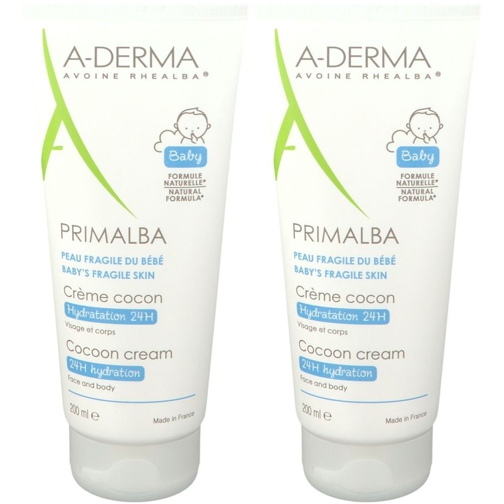 Deux tubes de crème A-DERMA PRIMALBA Baby Crème Cocon. Tubes blancs avec des accents verts et bleus. Texte: Baby, Crème cocon, Hydratation 24H.