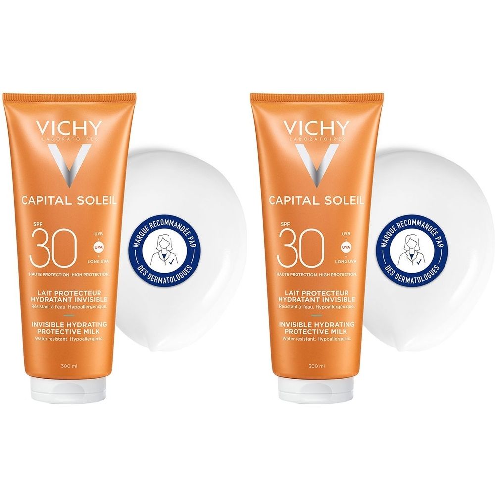Deux tubes de lait solaire SPF 30. Inscription: CAPITAL SOLEIL, VICHY. Accompagnés de couvercles blancs.