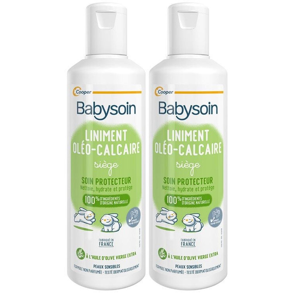 Deux flacons blancs de BABYSOIN Liniment Oléo-calcaire. Étiquettes vertes avec texte et illustrations de lapins. Fabriqué en France.