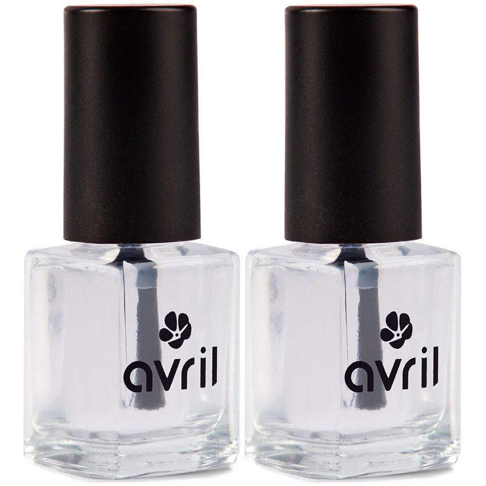 Deux flacons de vernis à ongles transparents avec bouchons noirs. Le mot "avril" est visible sur chaque flacon.