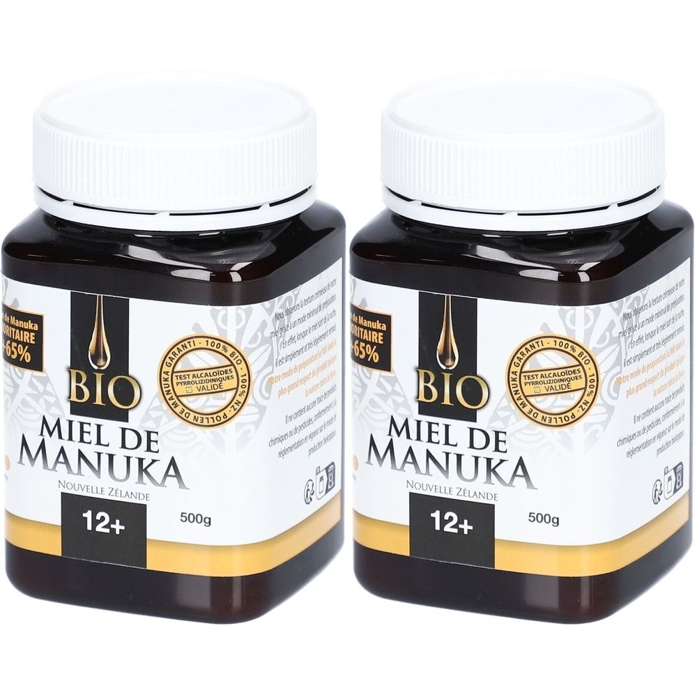 Deux pots de Miel de Manuka 12+ avec couvercles blancs. Inscription: BIO, Miel de Manuka, Nouvelle Zélande, 500g. Logo de certification.