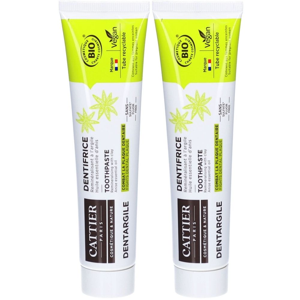 Deux tubes de dentifrice Cattier Dentargile. Blanc, avec texte et illustrations verts. Certifié vegan et bio.