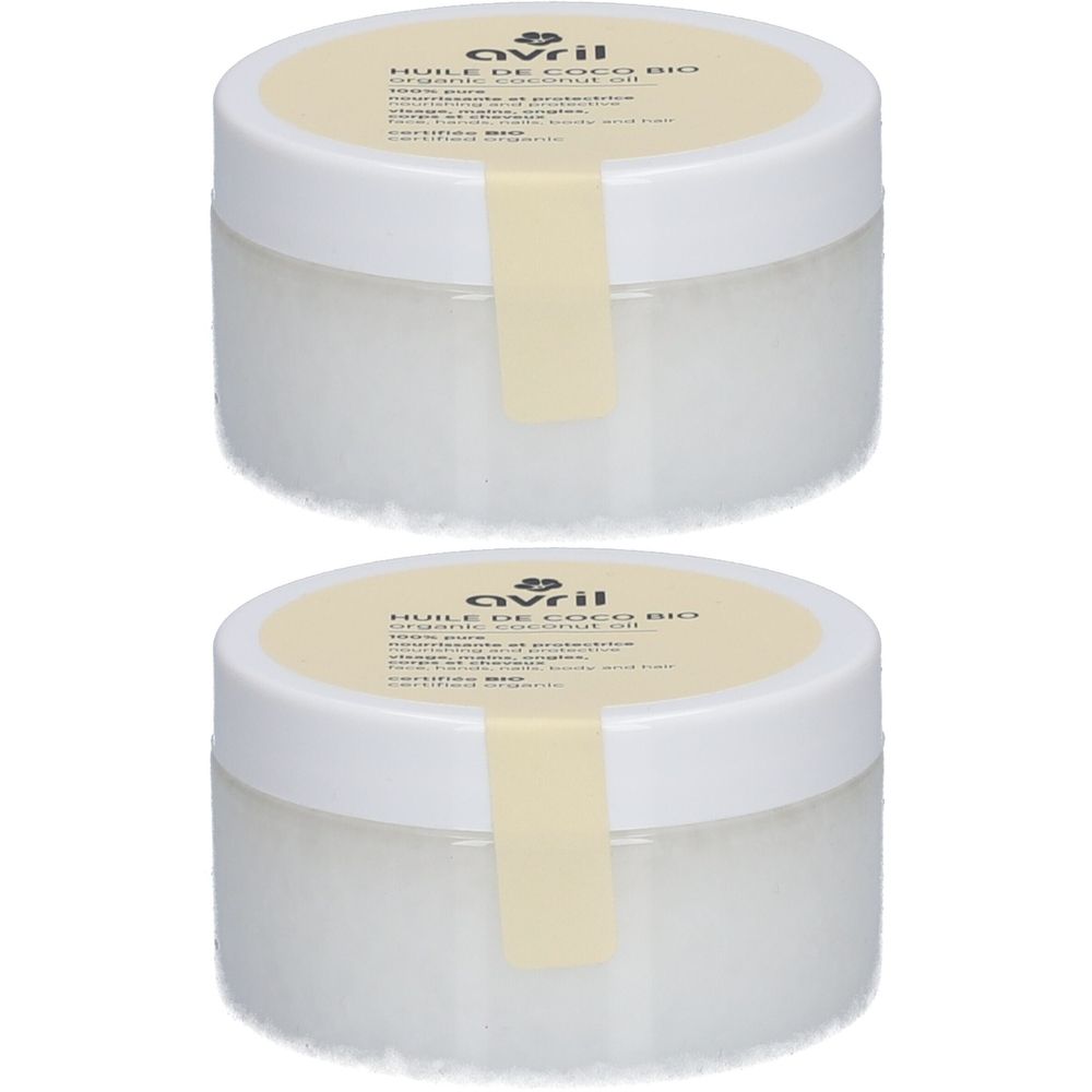 Deux pots ronds blancs avec couvercles et étiquettes. L'étiquette indique "Huile de Coco Bio" et la marque "Avril".