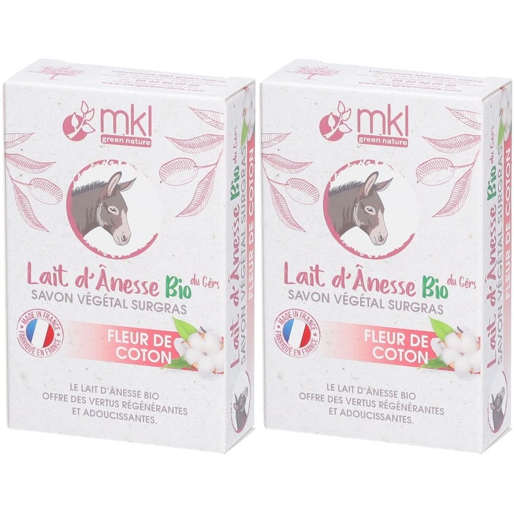 Deux boîtes de savon rectangulaires. Inscription : "mkl", "Lait d'Anesse Bio", "Fleur de Coton". Image d'un âne.