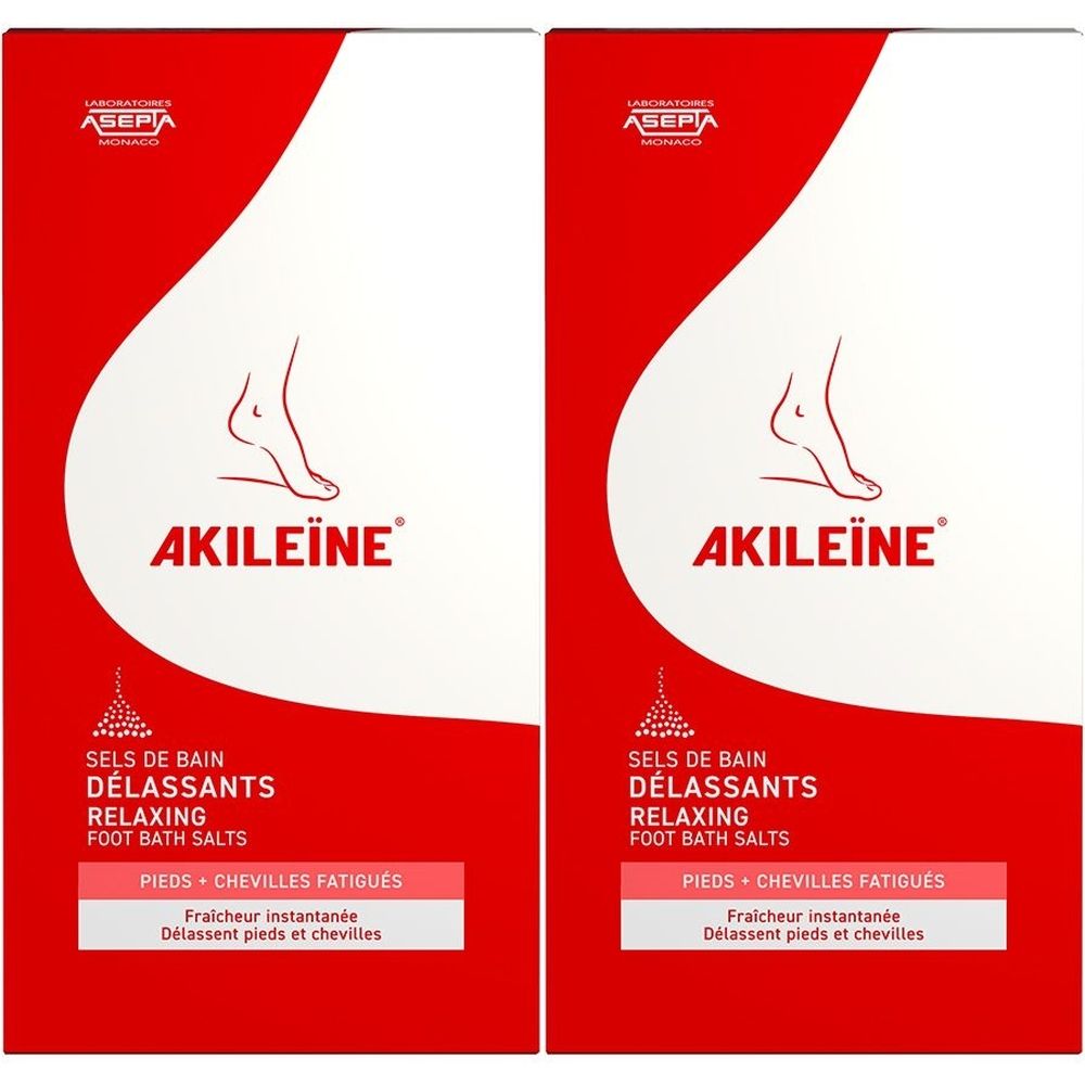 Deux boîtes de Sels de Bain Délassants AKILEÏNE. Emballage rouge et blanc avec illustration de pied. Texte: Relaxing Foot Bath Salts.