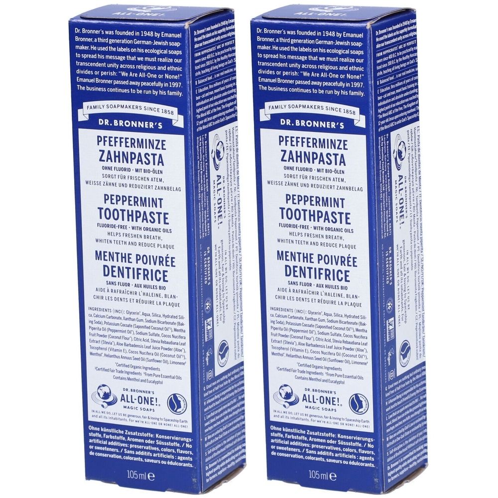 Deux boîtes bleues avec "Pfefferminze Zahnpasta". Texte en allemand, anglais et français. Marque : DR. BRONNER'S.
