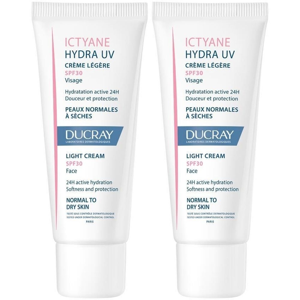 Deux tubes de crème Ictyane Hydra UV Crème légère visage SPF30. Tubes blancs avec texte rose et bleu. Marque: Ducray, Light Cream, SPF30.