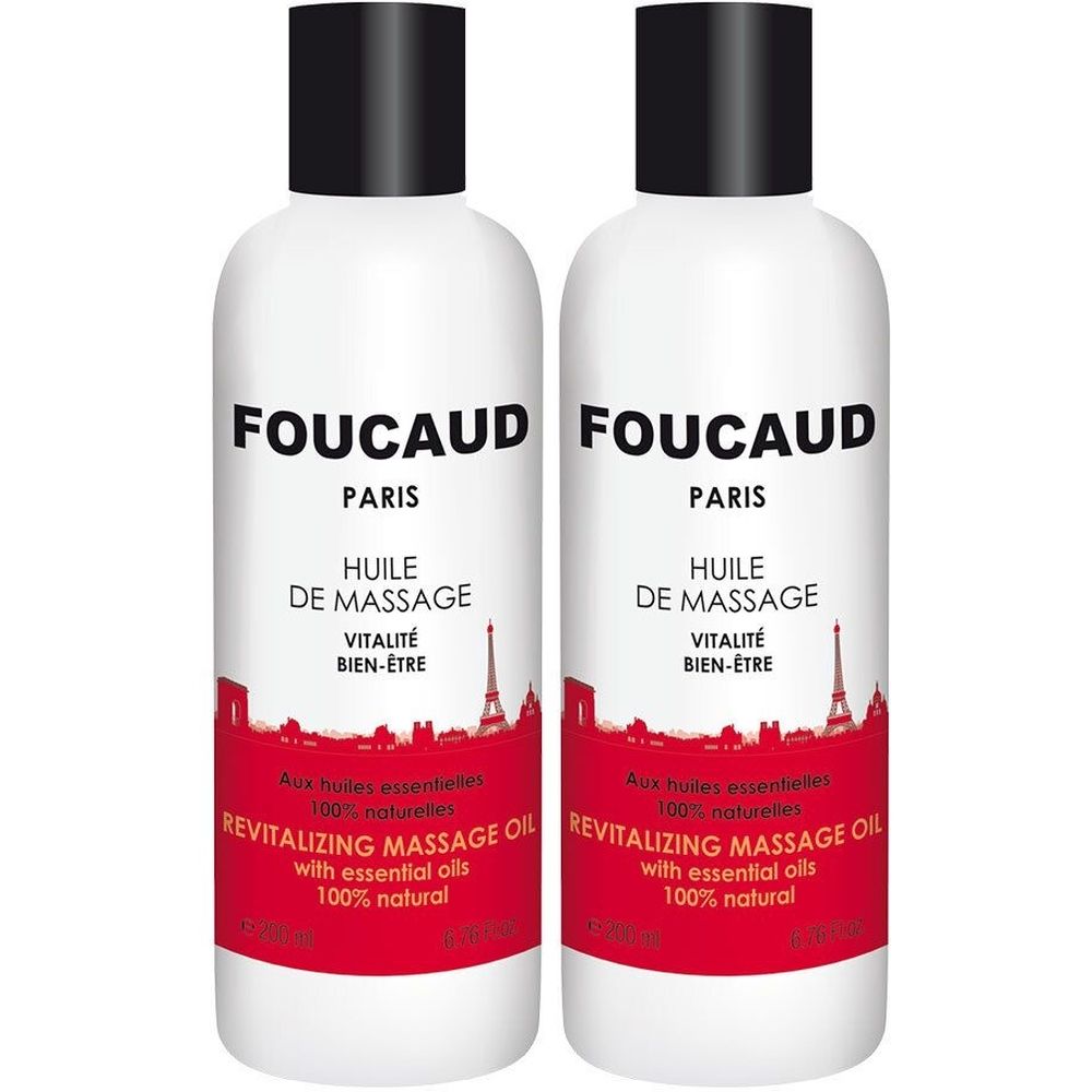 Deux flacons blancs avec bouchon noir. Inscription: Foucaud Paris, Huile de Massage, Vitalité Bien-Être. Impression rouge en bas.