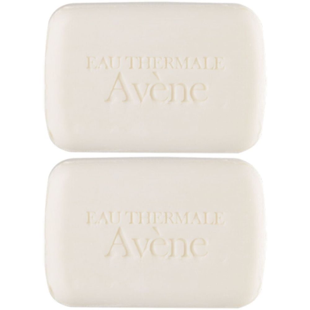 Deux pains de savon crème. Inscription "EAU THERMALE Avène" sur chaque pain.