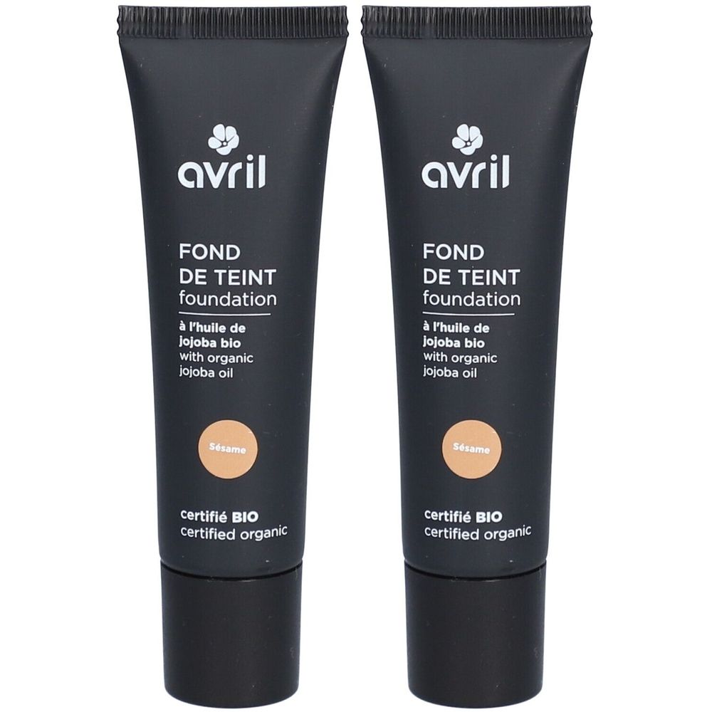 Deux tubes de fond de teint. Tubes noirs avec texte blanc. Inscription : Avril, Fond de Teint, huile de Jojoba, Sésame. Certifié Bio.