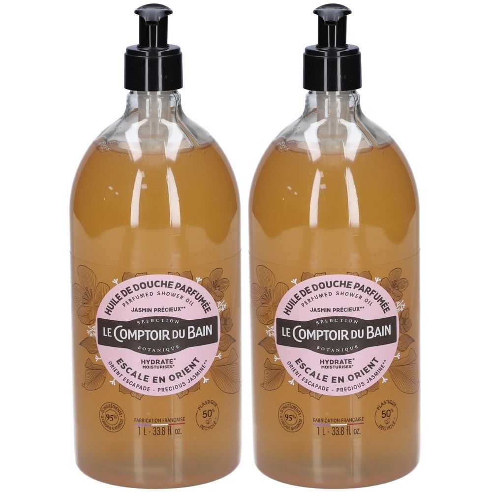 Deux flacons d'huile de douche avec bouchon pompe noir. Inscription : Le Comptoir du Bain, Escale en Orient.