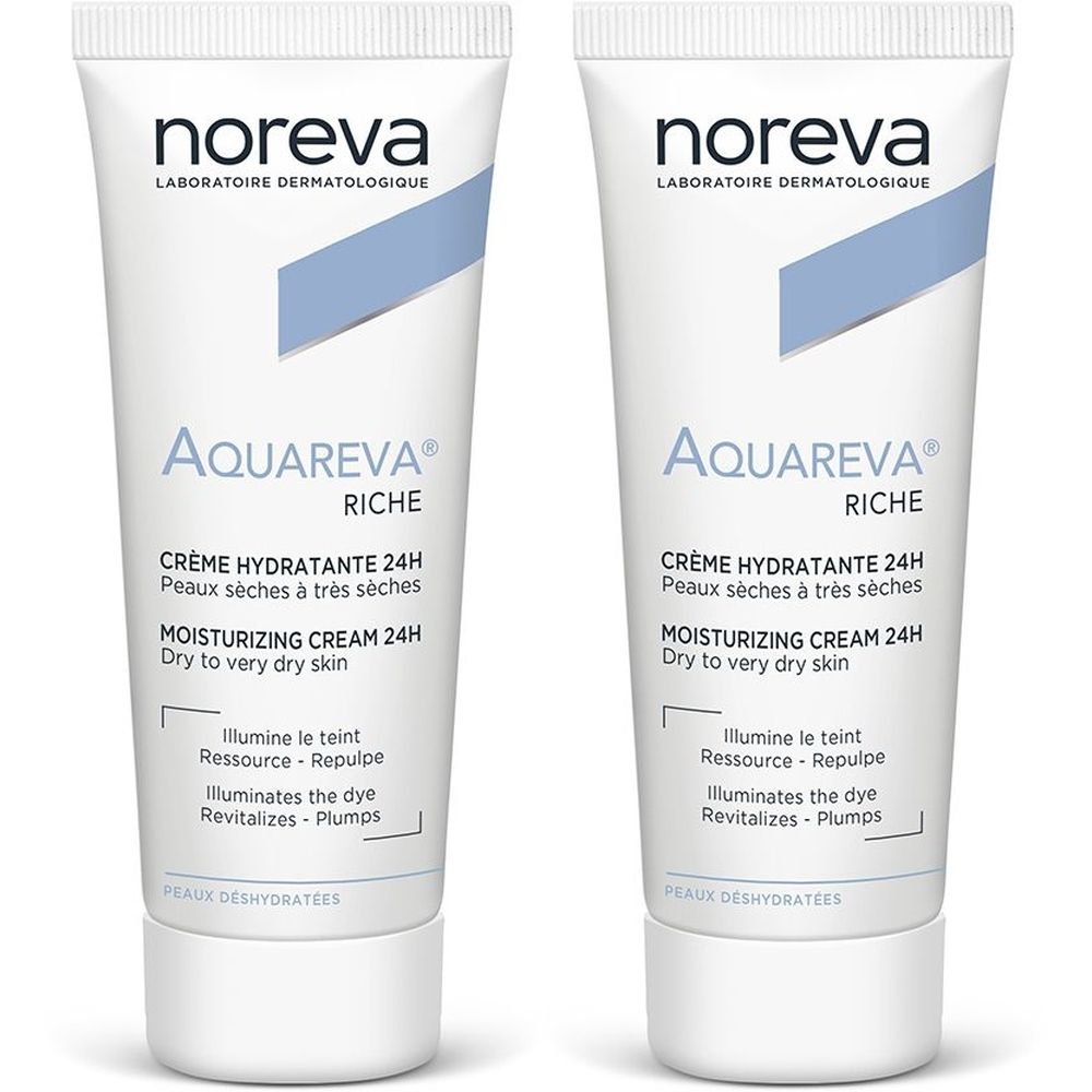 Deux tubes de crème hydratante Noreva Aquareva. Tubes blancs avec marquage bleu. Texte: Aquareva, Crème hydratante 24H, Peaux sèches à très sèches.