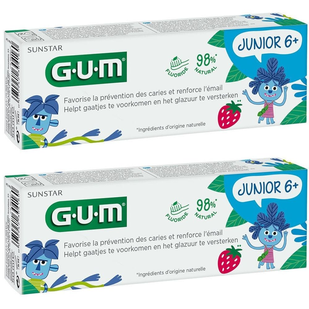 Deux tubes de dentifrice G.U.M Junior 6+. Emballage blanc avec logo, illustrations et texte. Contient du fluorure et 98% d'ingrédients naturels.